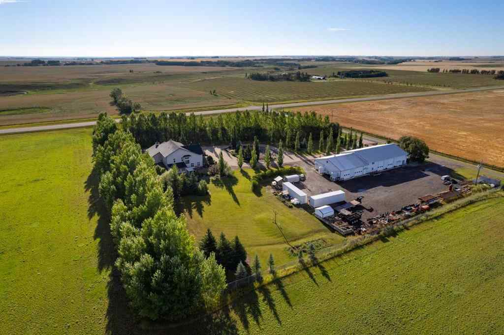 MLS® A2199828 - 31542 HWY 2A   in NONE Rural Mountain View County, Residential