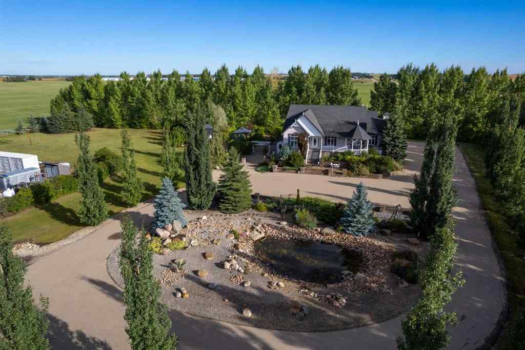 MLS® A2199828 - 31542 HWY 2A   in NONE Rural Mountain View County, Residential