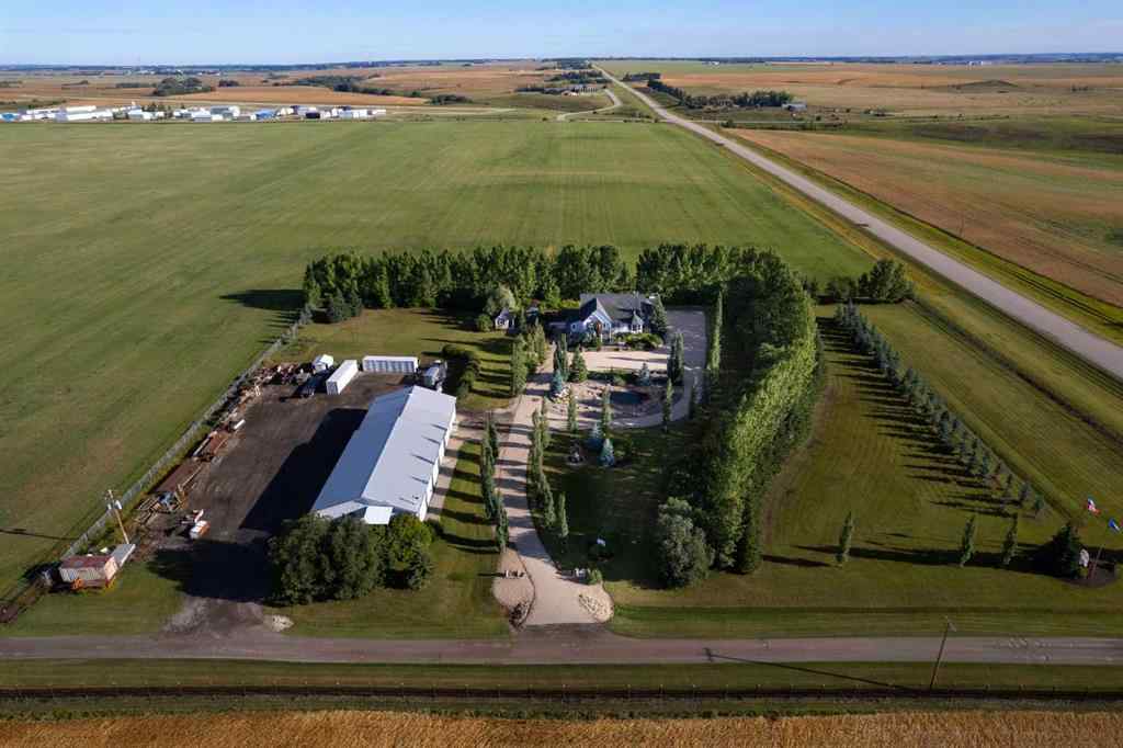 MLS® A2199828 - 31542 HWY 2A   in NONE Rural Mountain View County, Residential