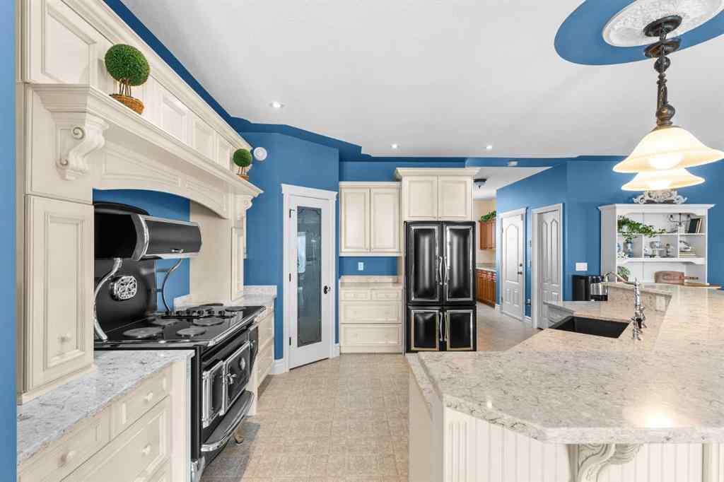 MLS® A2199828 - 31542 HWY 2A   in NONE Rural Mountain View County, Residential