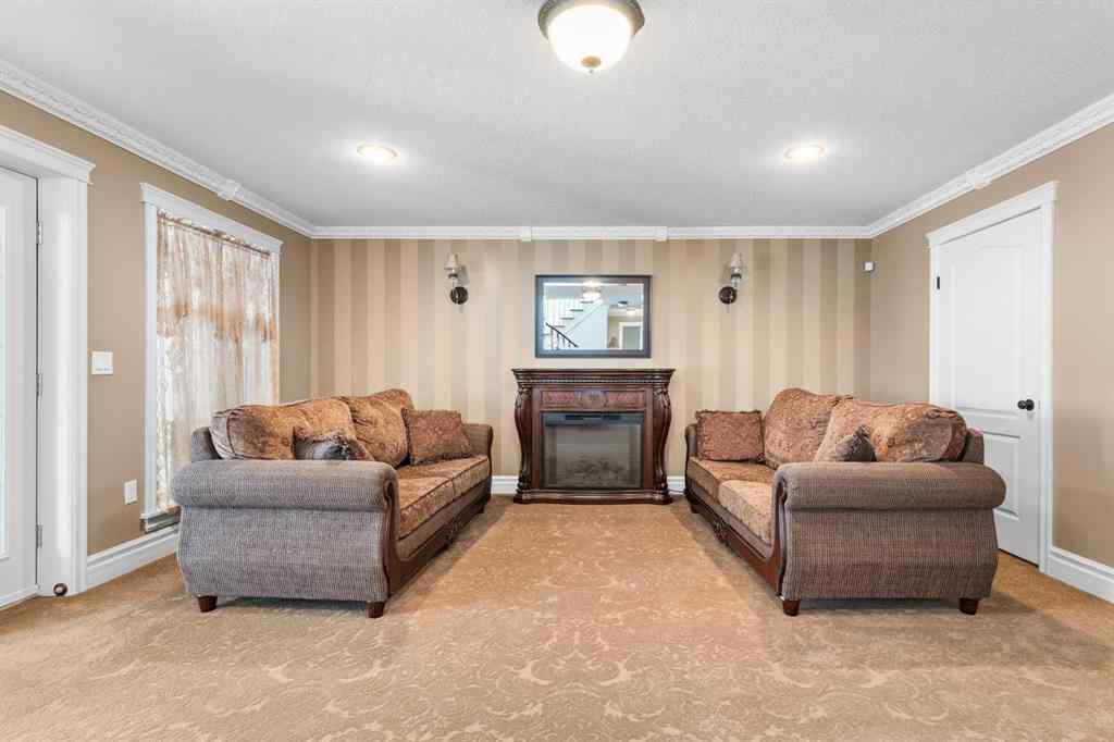 MLS® A2199828 - 31542 HWY 2A   in NONE Rural Mountain View County, Residential