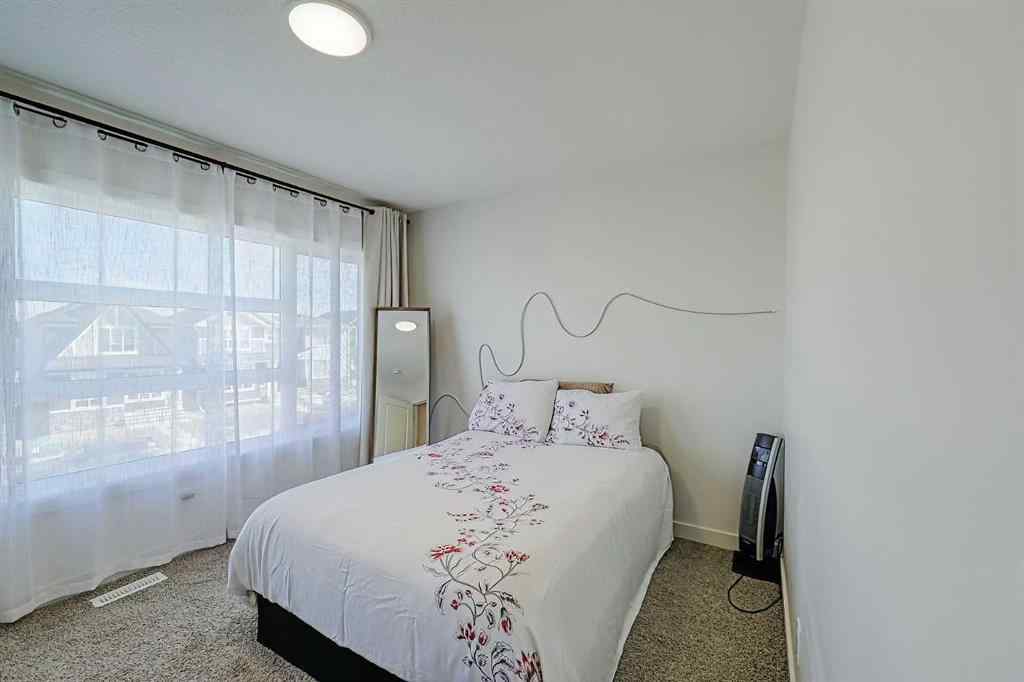 MLS® A2200152 - 25 Belmont Green SW in Belmont Calgary, Residential