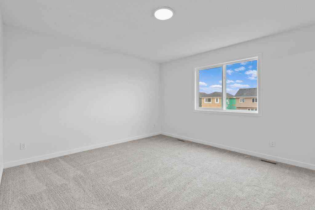 MLS® A2200715 - 1029 Reynolds Crescent SW in Coopers Crossing Airdrie, Residential