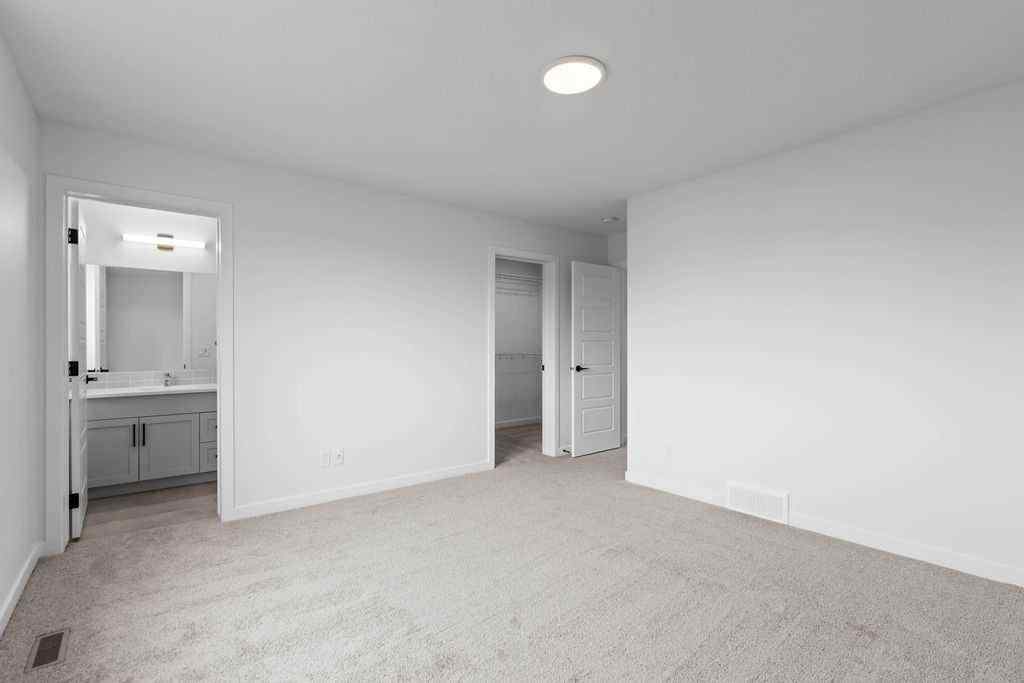 MLS® A2200715 - 1029 Reynolds Crescent SW in Coopers Crossing Airdrie, Residential