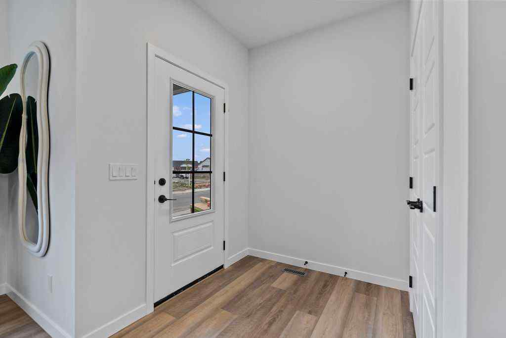 MLS® A2201126 - 1037 Reynolds Crescent SW in Coopers Crossing Airdrie, Residential