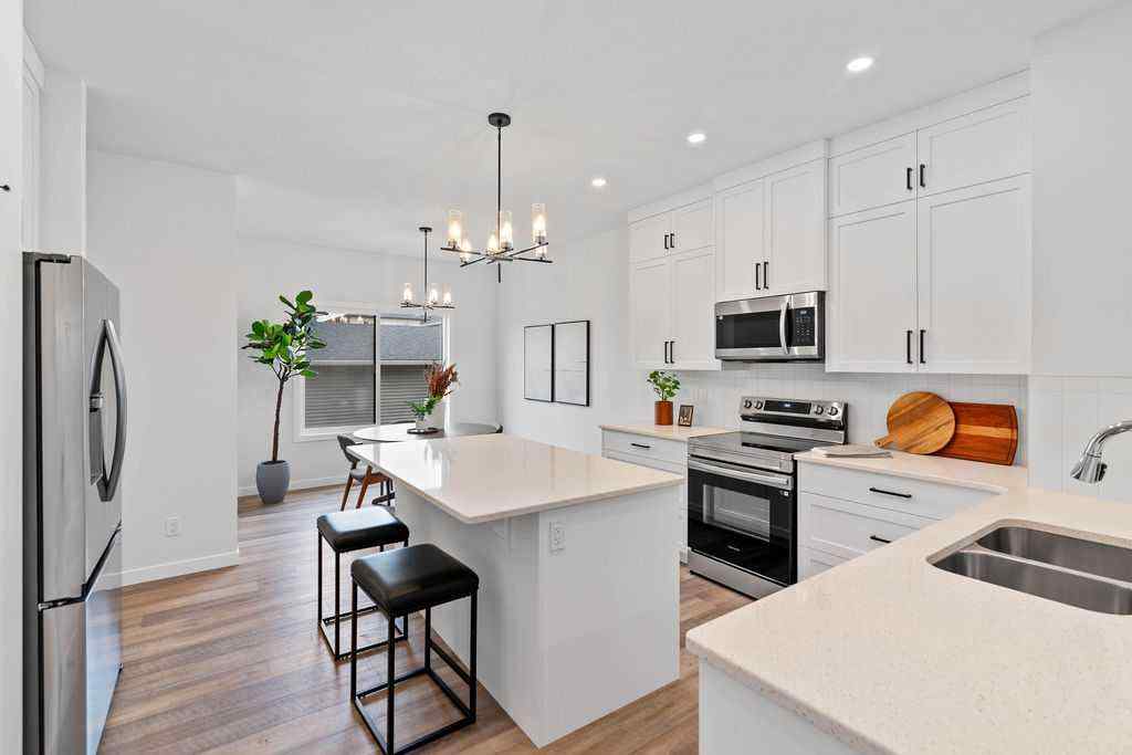 MLS® A2201126 - 1037 Reynolds Crescent SW in Coopers Crossing Airdrie, Residential