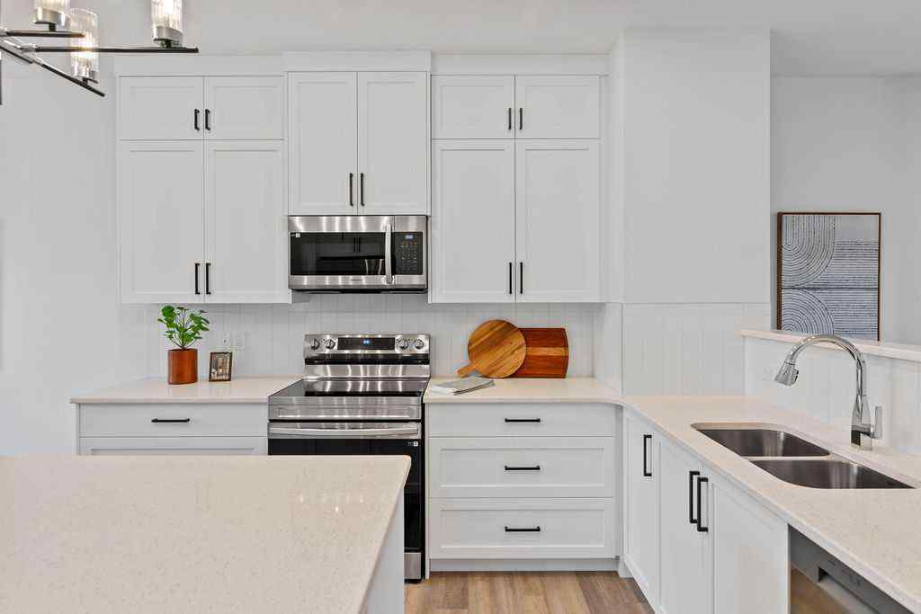 MLS® A2201126 - 1037 Reynolds Crescent SW in Coopers Crossing Airdrie, Residential