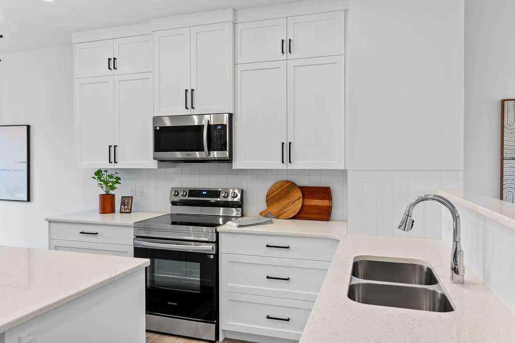 MLS® A2201126 - 1037 Reynolds Crescent SW in Coopers Crossing Airdrie, Residential