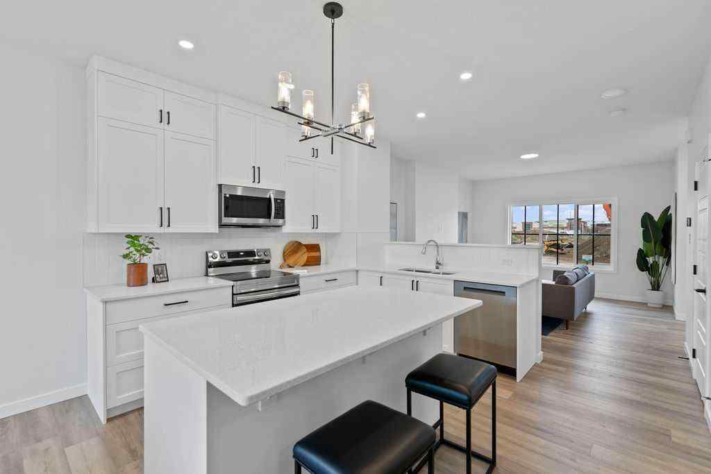 MLS® A2201126 - 1037 Reynolds Crescent SW in Coopers Crossing Airdrie, Residential