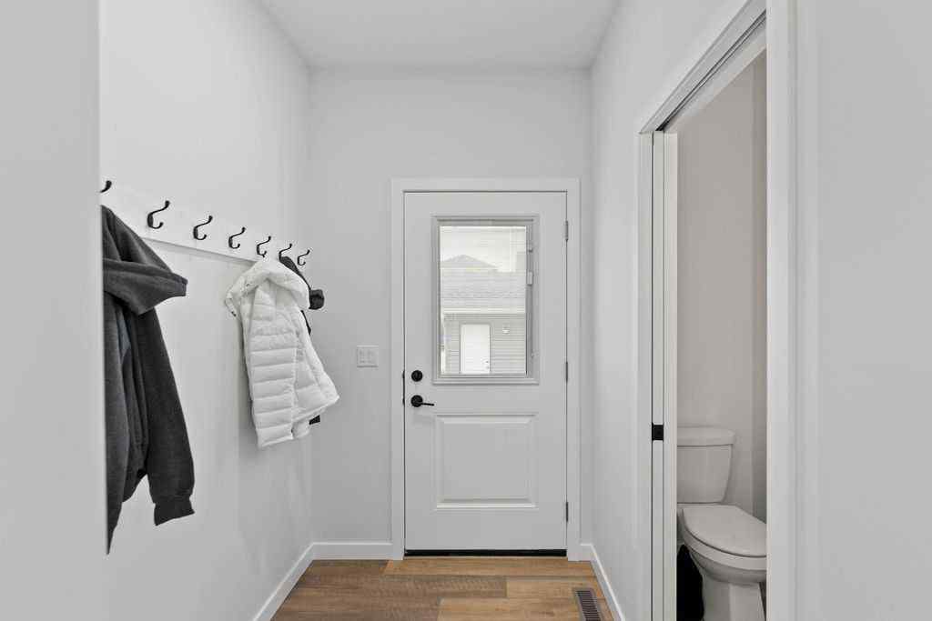 MLS® A2201126 - 1037 Reynolds Crescent SW in Coopers Crossing Airdrie, Residential