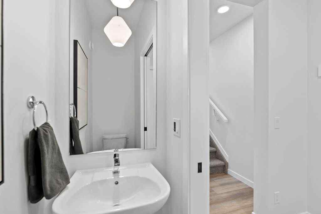 MLS® A2201126 - 1037 Reynolds Crescent SW in Coopers Crossing Airdrie, Residential