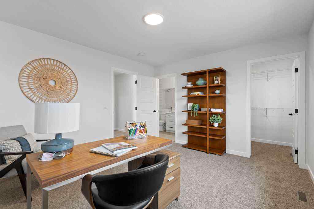MLS® A2201126 - 1037 Reynolds Crescent SW in Coopers Crossing Airdrie, Residential