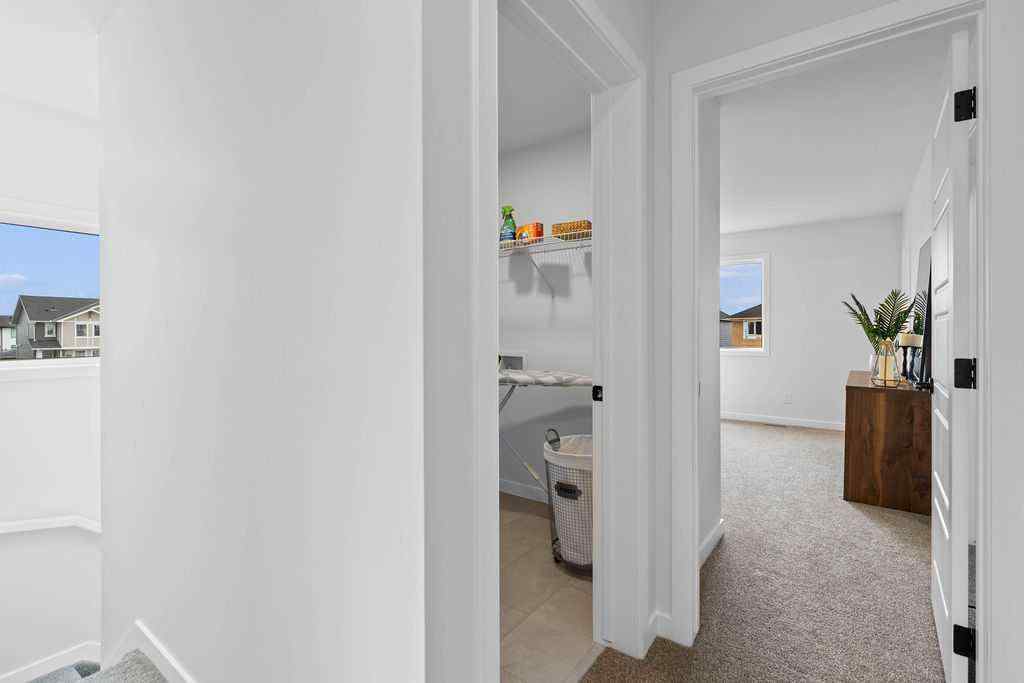 MLS® A2201126 - 1037 Reynolds Crescent SW in Coopers Crossing Airdrie, Residential