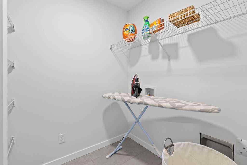 MLS® A2201126 - 1037 Reynolds Crescent SW in Coopers Crossing Airdrie, Residential