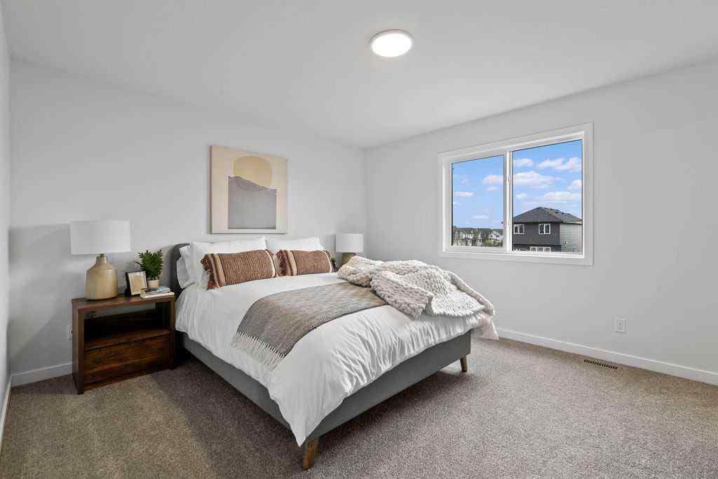 MLS® A2201126 - 1037 Reynolds Crescent SW in Coopers Crossing Airdrie, Residential