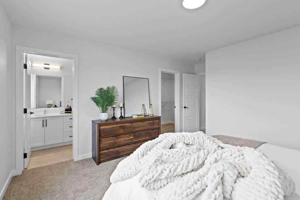 MLS® A2201126 - 1037 Reynolds Crescent SW in Coopers Crossing Airdrie, Residential