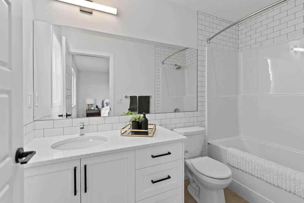MLS® A2201126 - 1037 Reynolds Crescent SW in Coopers Crossing Airdrie, Residential