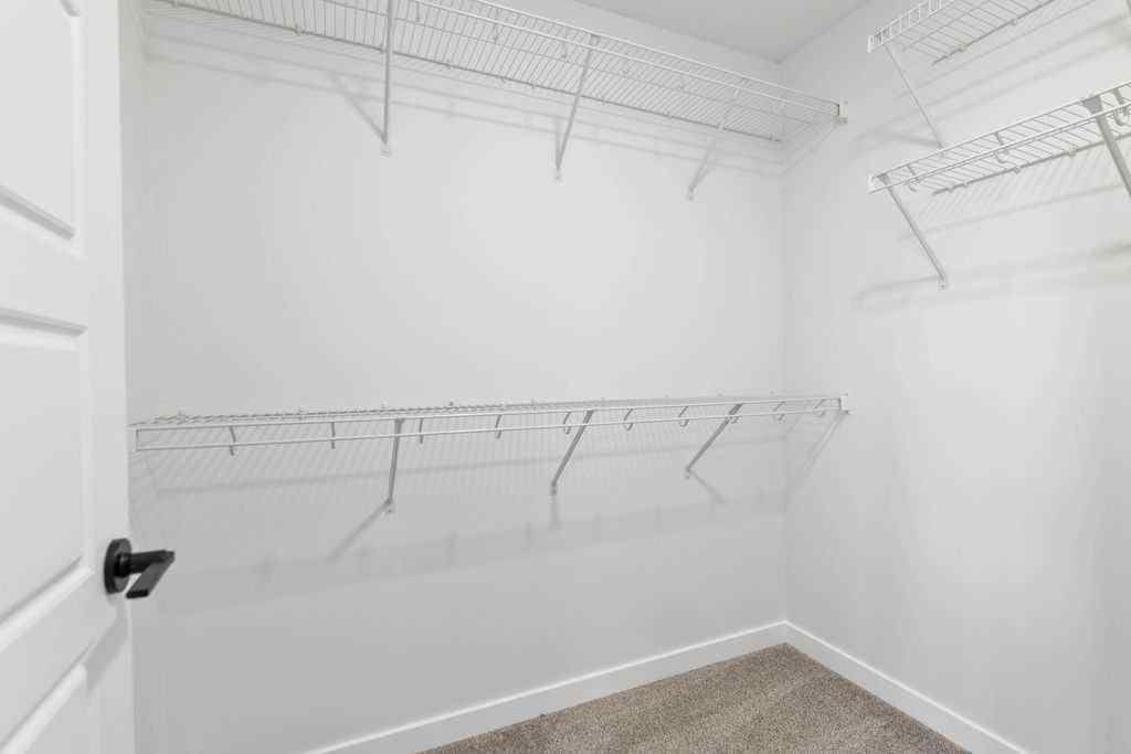 MLS® A2201126 - 1037 Reynolds Crescent SW in Coopers Crossing Airdrie, Residential