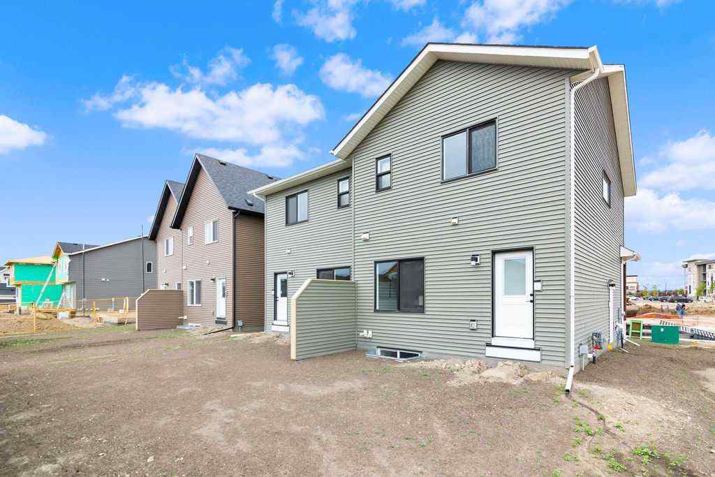 MLS® A2201126 - 1037 Reynolds Crescent SW in Coopers Crossing Airdrie, Residential