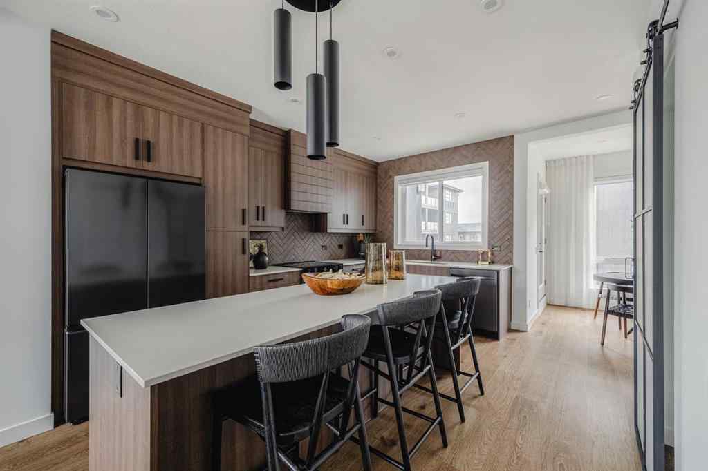 MLS® A2201583 - 23 Lucas Way NW in Livingston Calgary, Residential