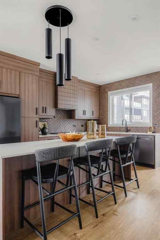 MLS® A2201583 - 23 Lucas Way NW in Livingston Calgary, Residential