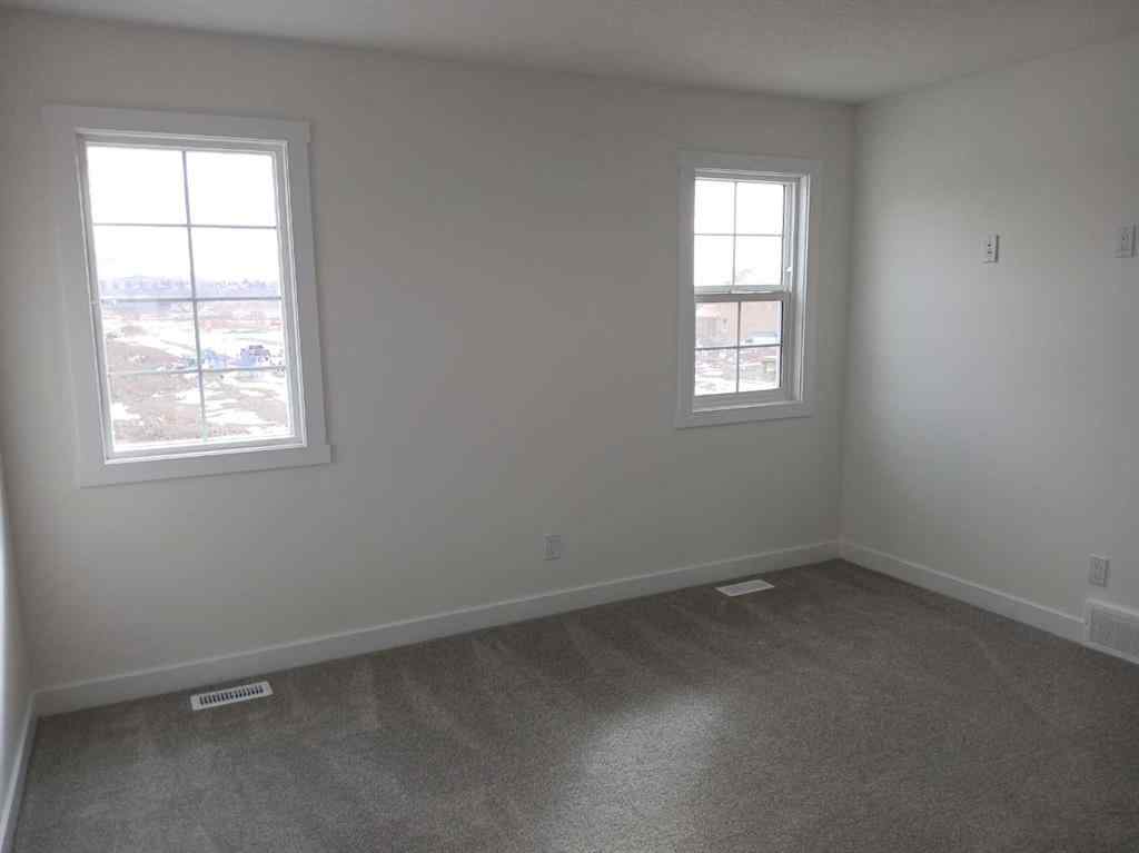 MLS® A2201663 - 392 Heartland Way  in Heartland Cochrane, Residential