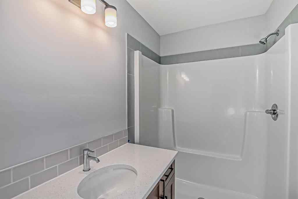 MLS® A2201917 - 23 Agate Road  in Greystone Cochrane, Residential