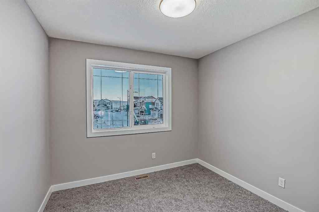 MLS® A2201917 - 23 Agate Road  in Greystone Cochrane, Residential