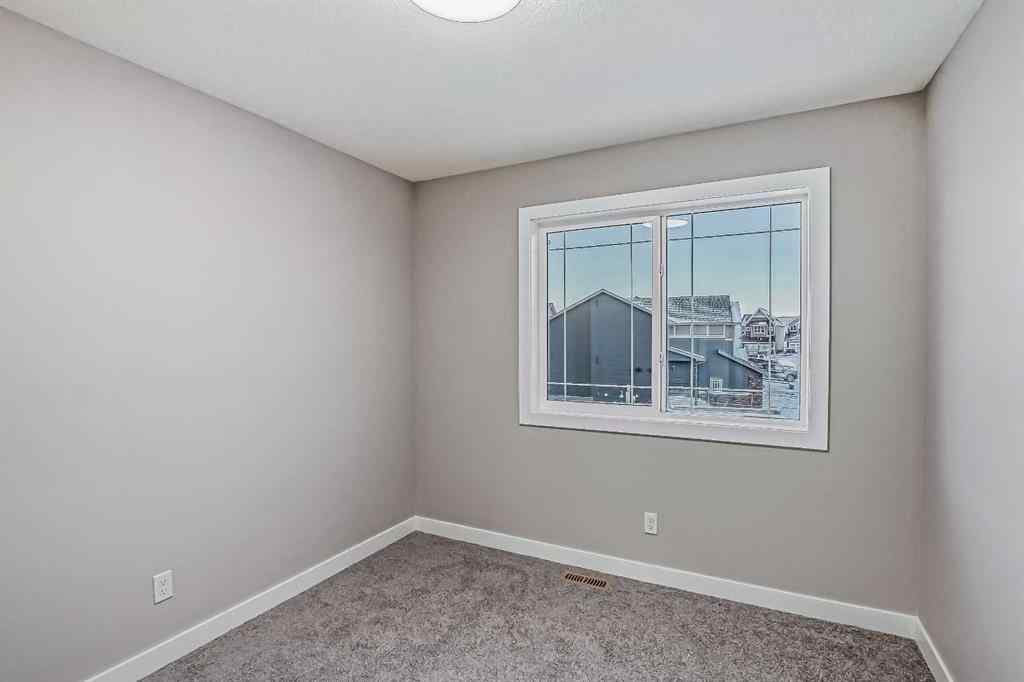 MLS® A2201917 - 23 Agate Road  in Greystone Cochrane, Residential