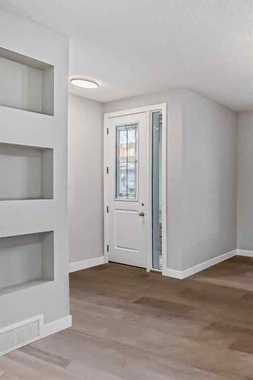 MLS® A2201917 - 23 Agate Road  in Greystone Cochrane, Residential