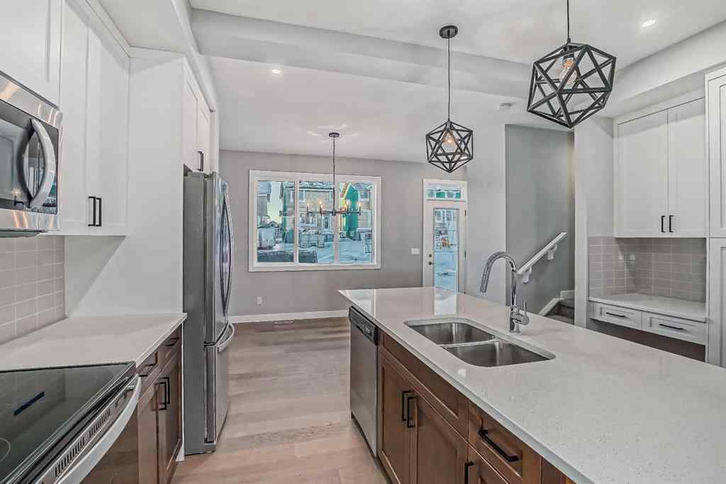 MLS® A2201917 - 23 Agate Road  in Greystone Cochrane, Residential
