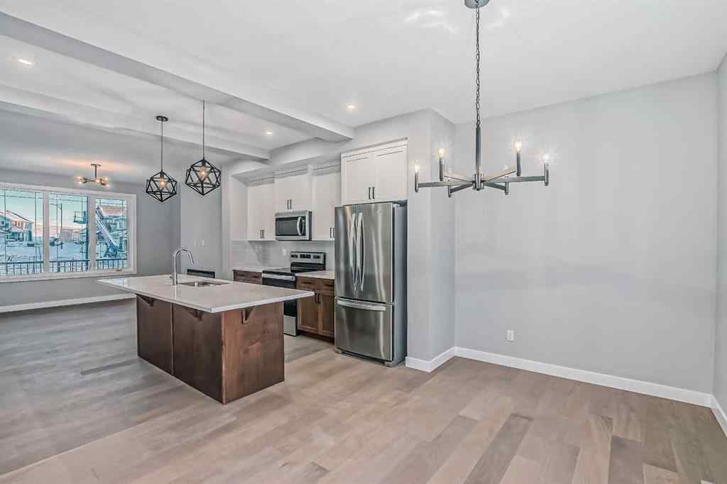 MLS® A2201917 - 23 Agate Road  in Greystone Cochrane, Residential