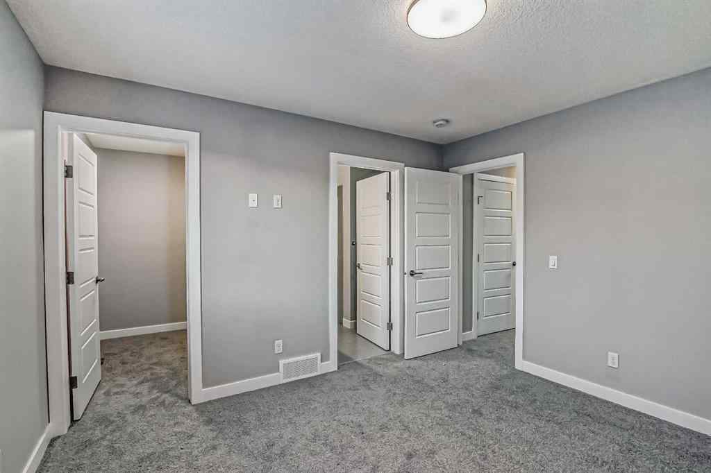 MLS® A2201917 - 23 Agate Road  in Greystone Cochrane, Residential