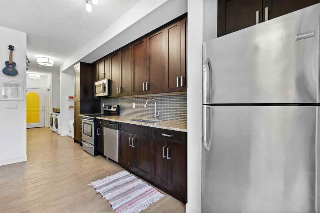 MLS® A2202532 - Unit #105 130 Auburn Meadows View SE in Auburn Bay Calgary, Residential
