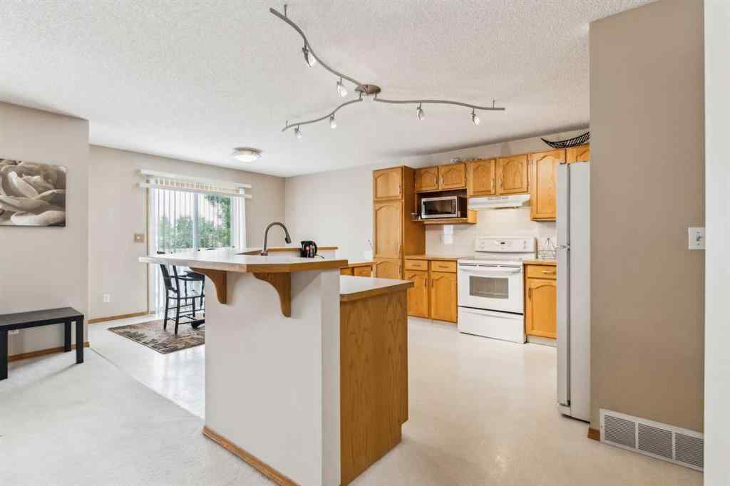 MLS® A2202575 - 1210 Harvest Hills Drive NE in Harvest Hills Calgary, Residential