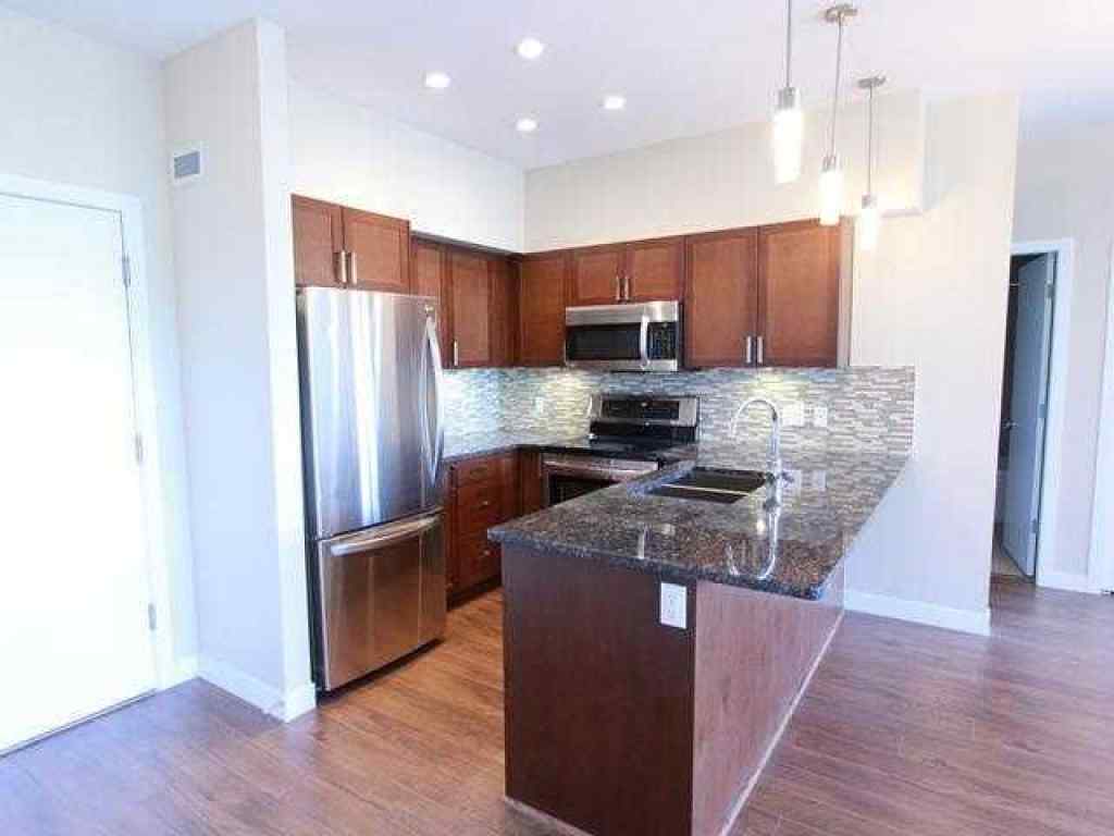 MLS® A2202633 - Unit #203 4303 1 Street NE in Highland Park Calgary, Residential