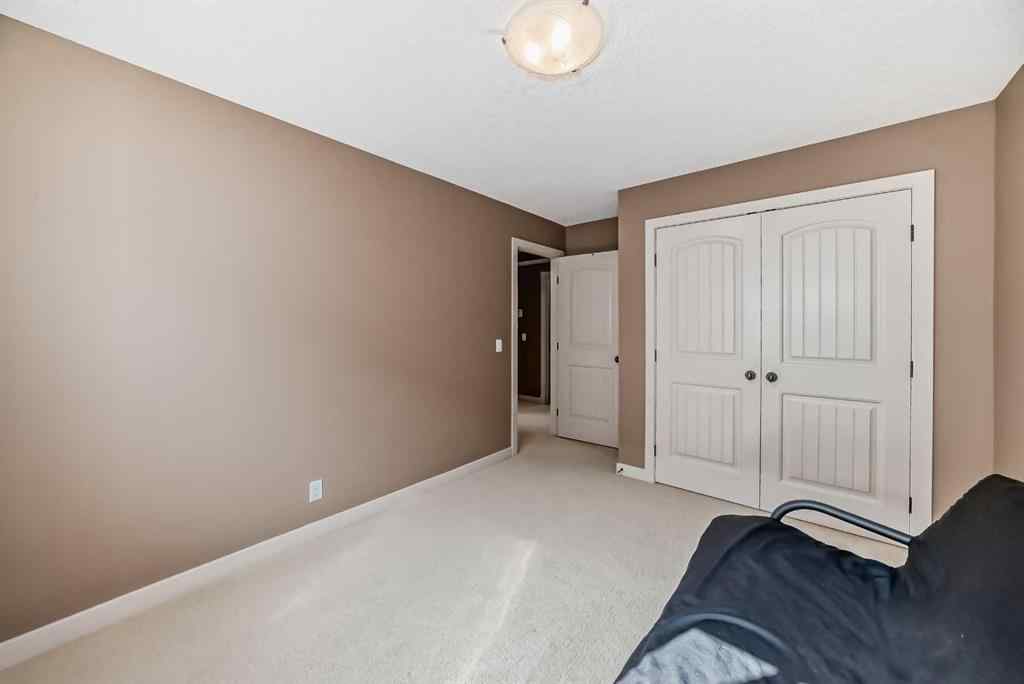 MLS® A2203902 - 135 Ridge View Green  in River Song Cochrane, Residential