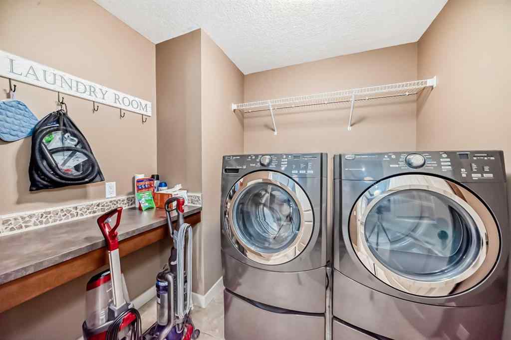 MLS® A2203902 - 135 Ridge View Green  in River Song Cochrane, Residential