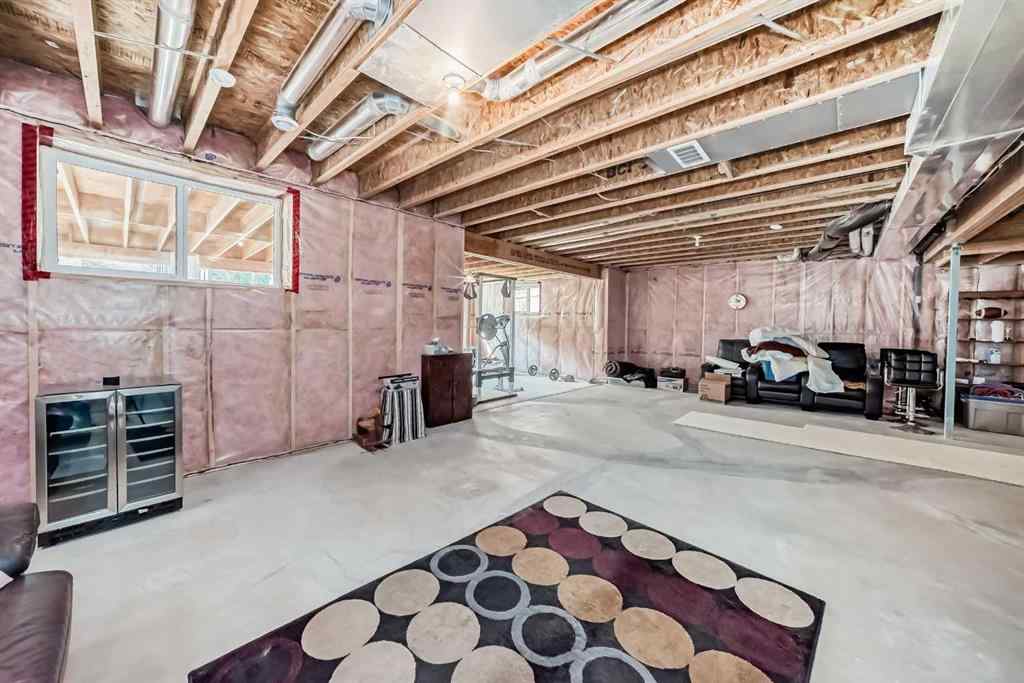 MLS® A2203902 - 135 Ridge View Green  in River Song Cochrane, Residential