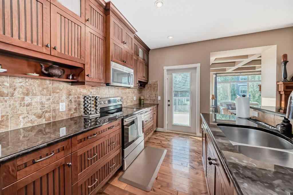 MLS® A2203902 - 135 Ridge View Green  in River Song Cochrane, Residential