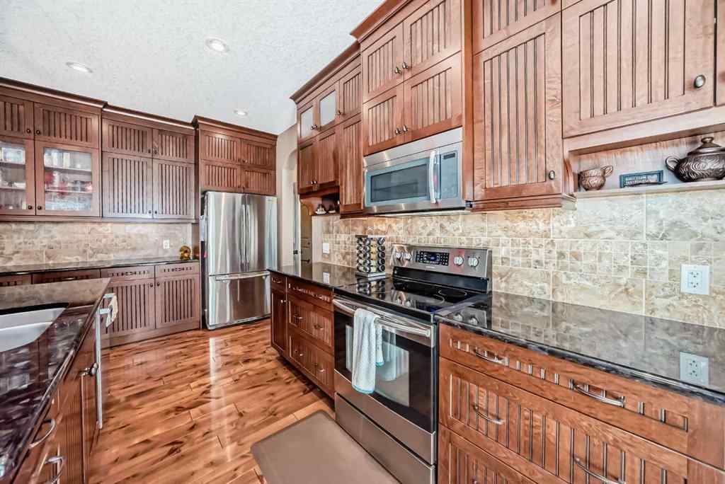 MLS® A2203902 - 135 Ridge View Green  in River Song Cochrane, Residential