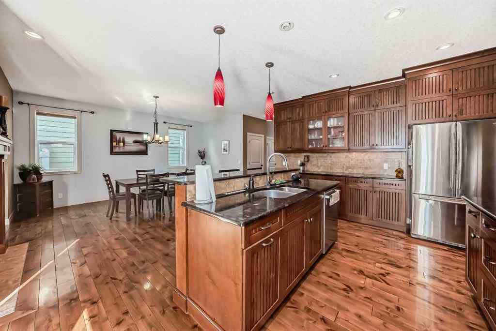 MLS® A2203902 - 135 Ridge View Green  in River Song Cochrane, Residential