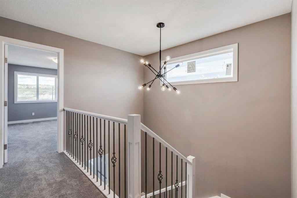 MLS® A2204804 - 140 Sundown Crescent  in Sunset Ridge Cochrane, Residential