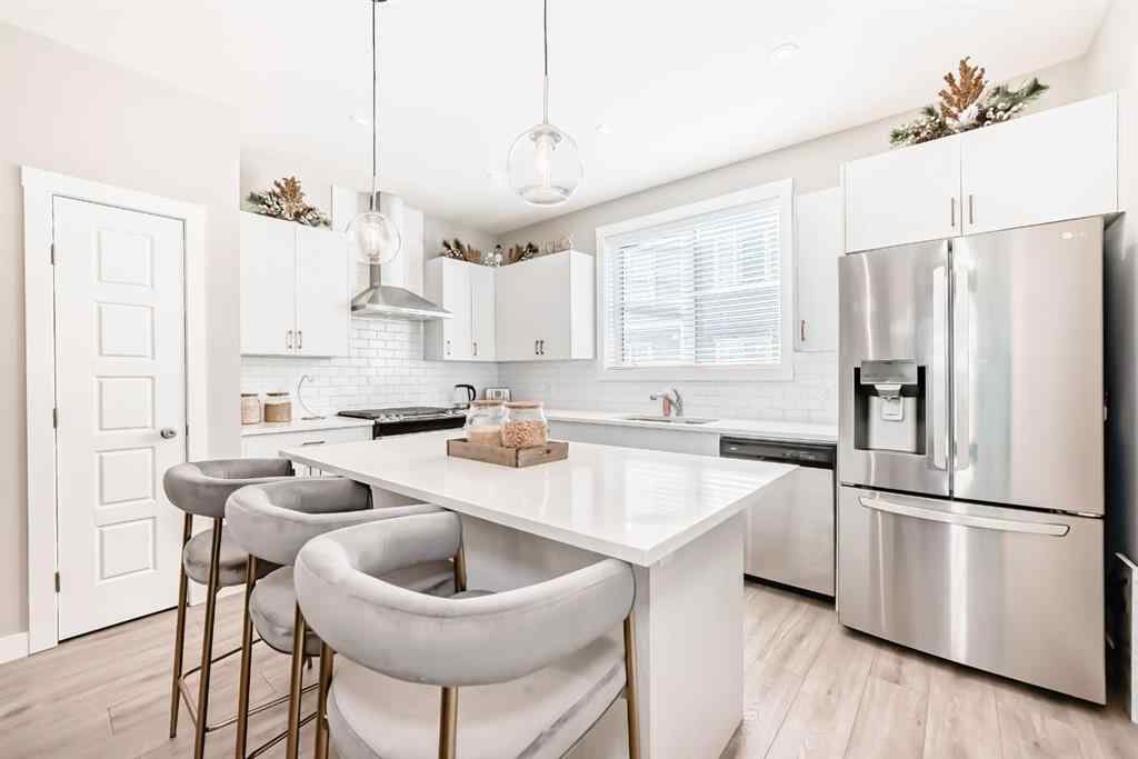 MLS® A2204931 - 410 Cranbrook Walk SE in Cranston Calgary, Residential