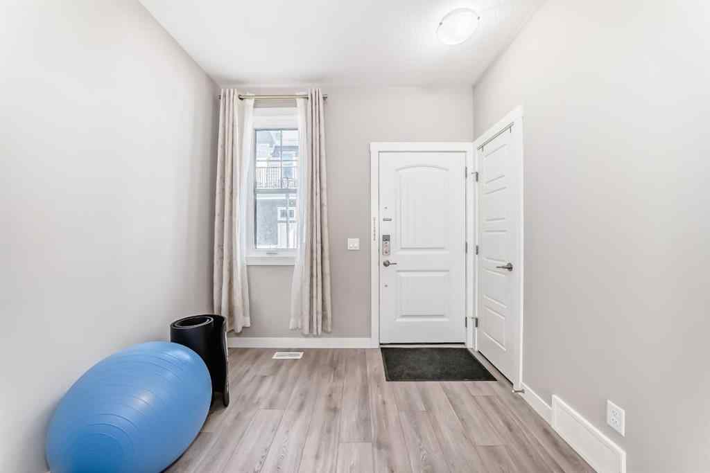 MLS® A2204931 - 410 Cranbrook Walk SE in Cranston Calgary, Residential