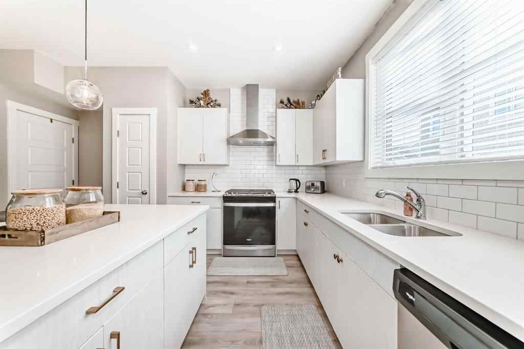 MLS® A2204931 - 410 Cranbrook Walk SE in Cranston Calgary, Residential