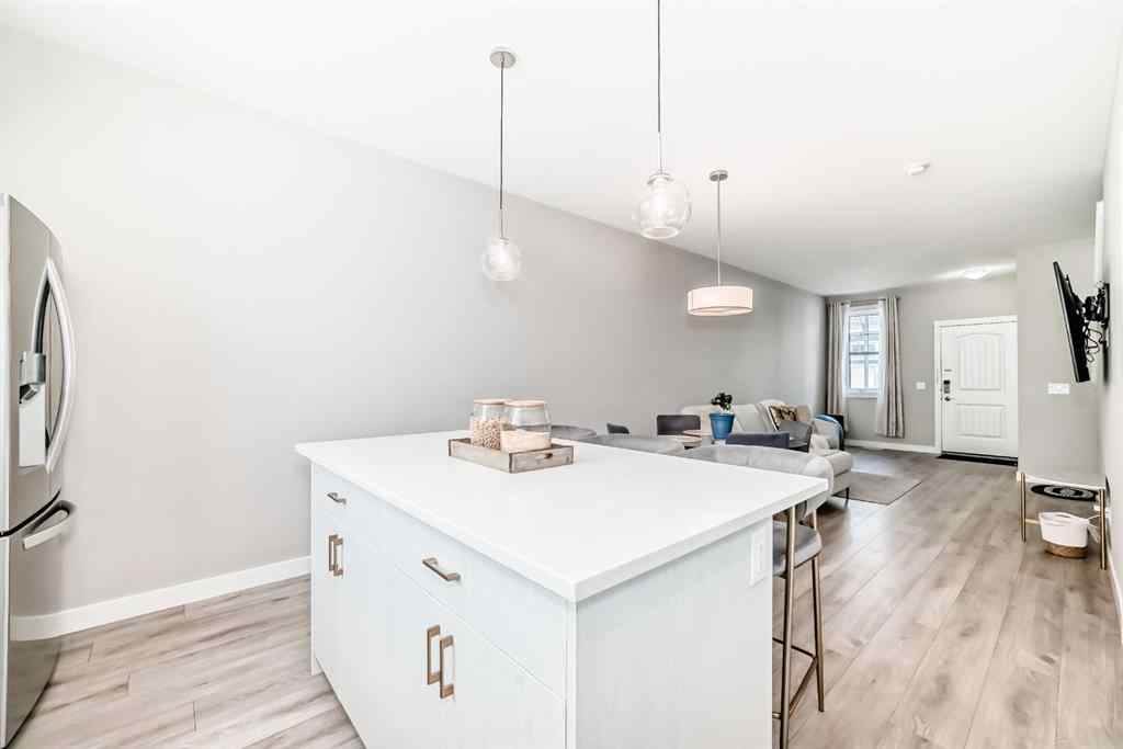 MLS® A2204931 - 410 Cranbrook Walk SE in Cranston Calgary, Residential