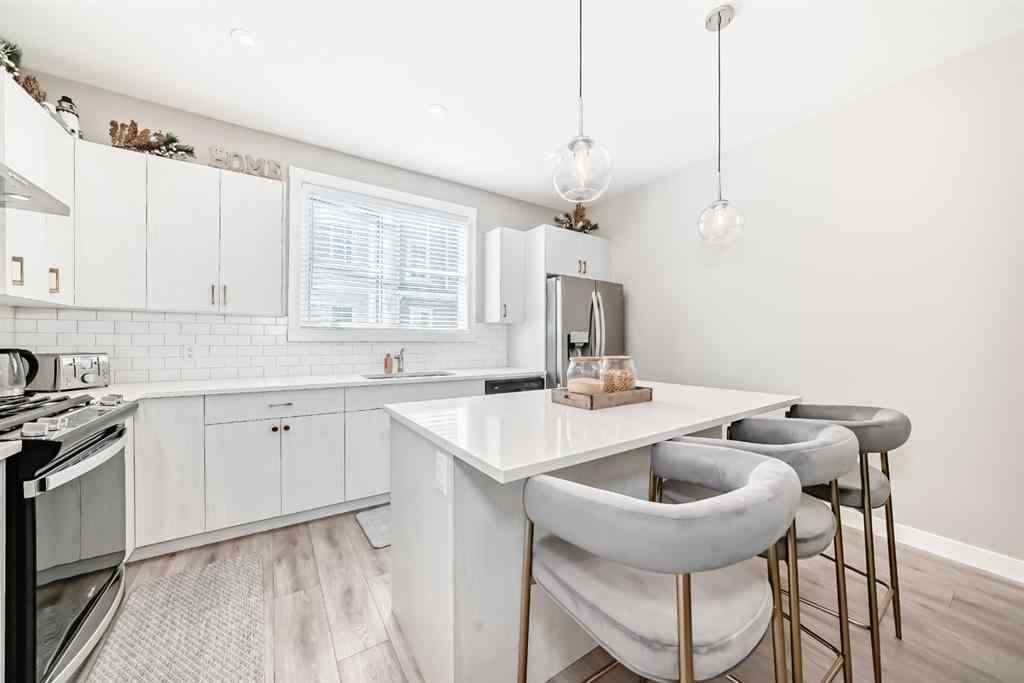MLS® A2204931 - 410 Cranbrook Walk SE in Cranston Calgary, Residential
