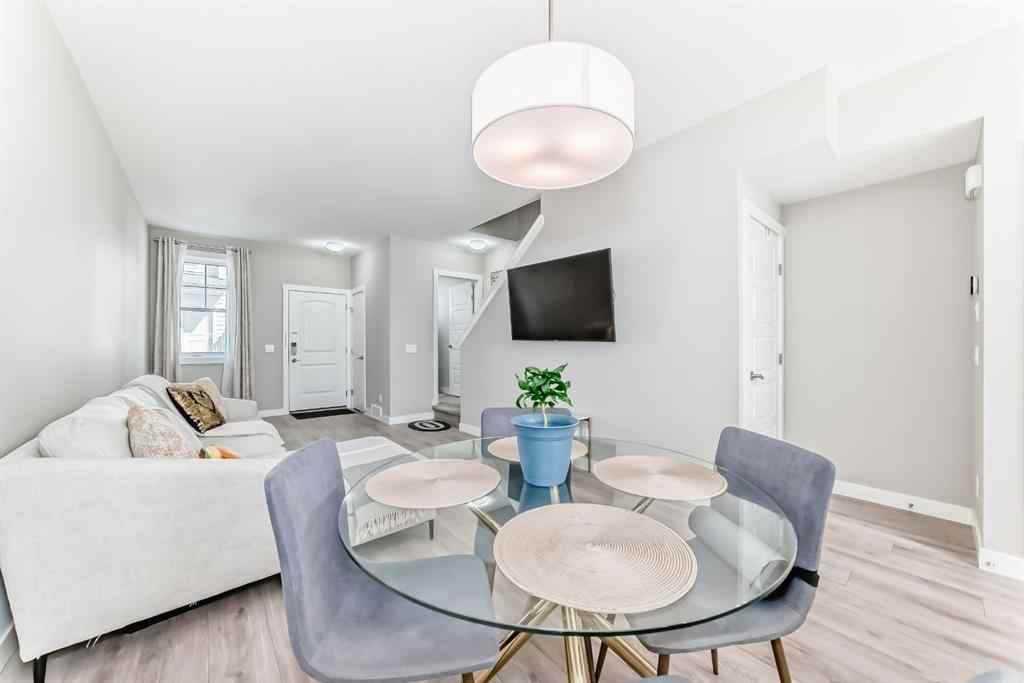 MLS® A2204931 - 410 Cranbrook Walk SE in Cranston Calgary, Residential