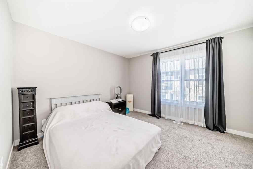 MLS® A2204931 - 410 Cranbrook Walk SE in Cranston Calgary, Residential